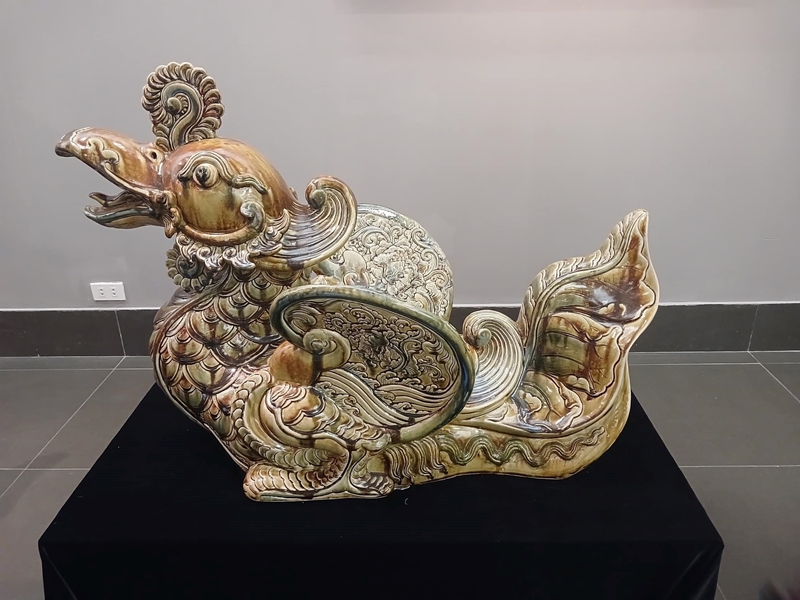 Sacred animal statues imbued with Bat Trang ceramic art on display