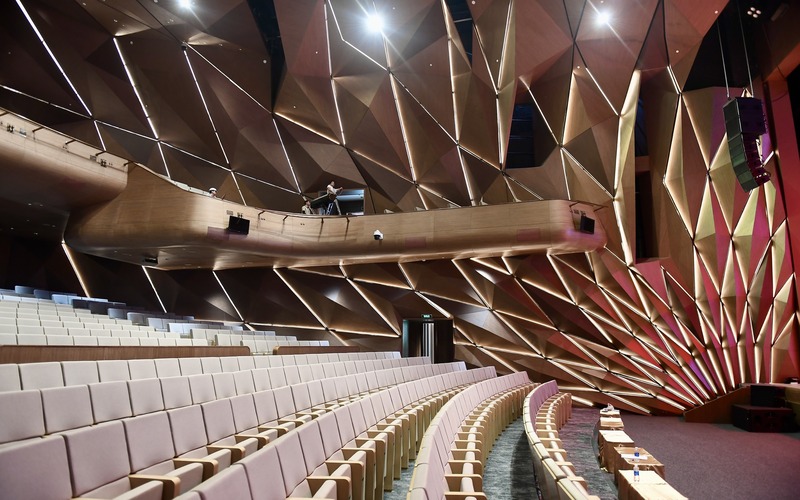  The small auditorium is designed like a blooming flower to spread sound waves.