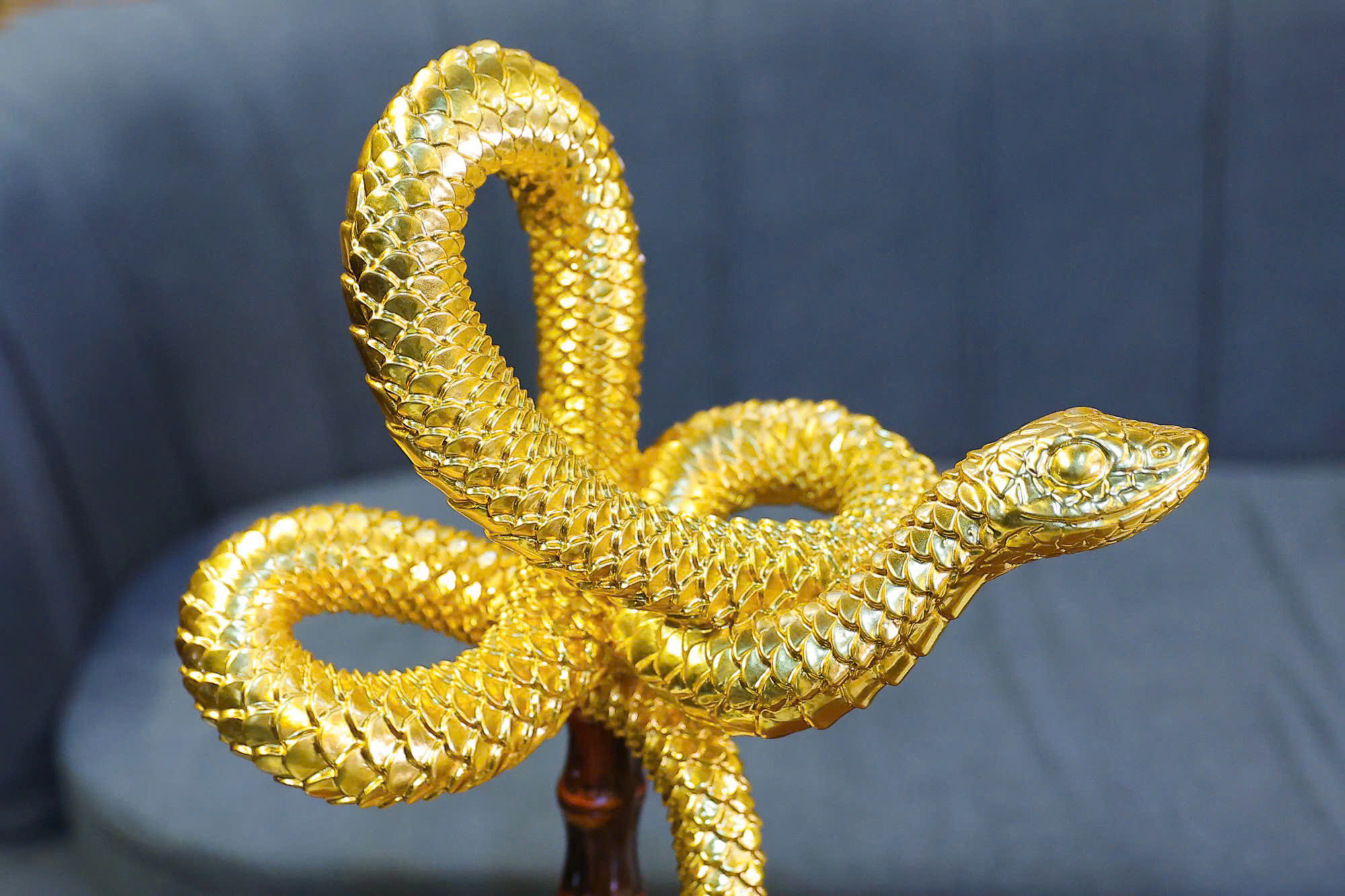 A glimpse of the 24K gold Lunar New Year 2025 Snake Mascot