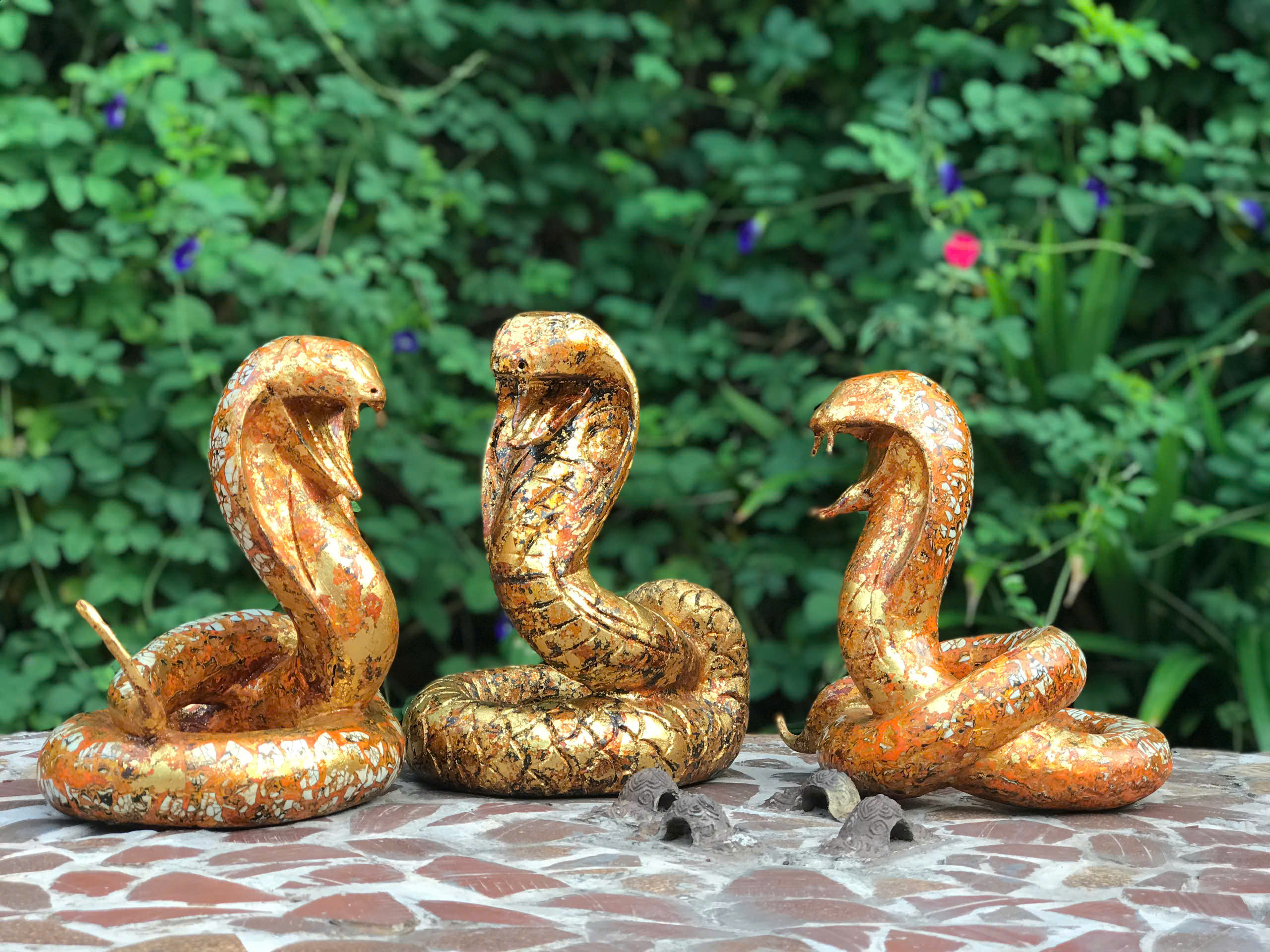 Behold the unique collection of snake lacquer statues