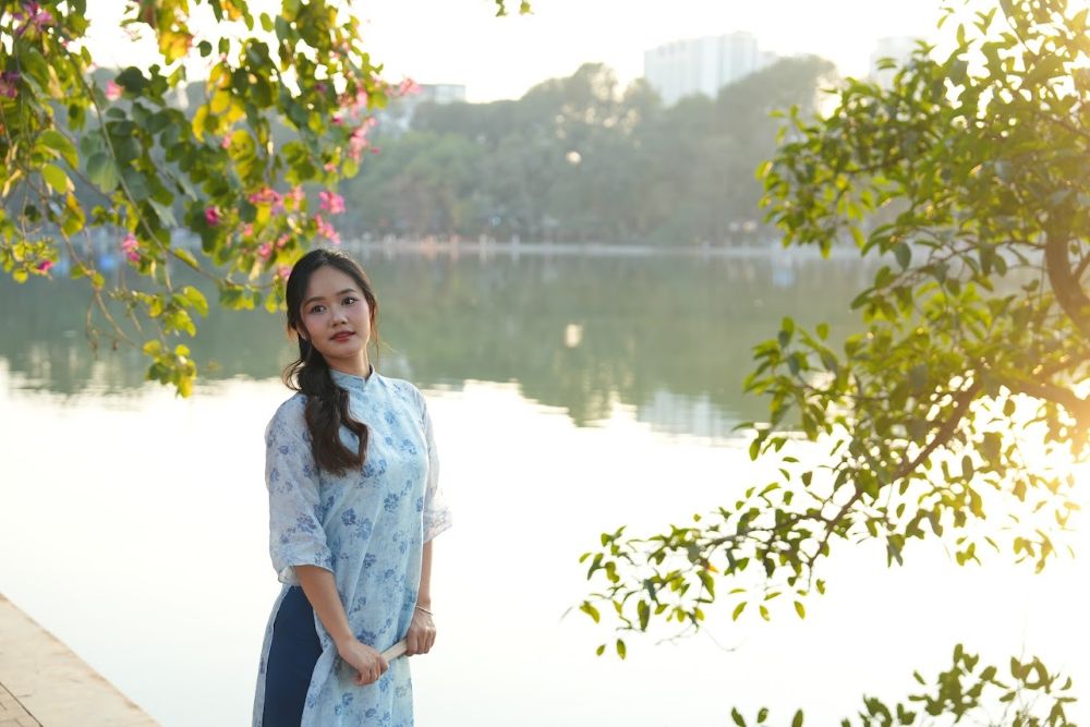 colorful ao dai by the lake