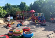 Hanoian children enjoy recycled playgrounds