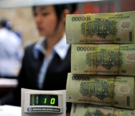 Vietnam c.bank cuts rate on banks’ reserve requirements first time since 2005