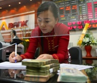 Vietnam government to consider reducing ownership at state-run commercial banks