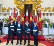 Japan, Vietnam firms ink billion-dollar gas power projects during Suga's visit