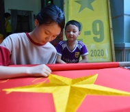 A busy time for old flag making village in Hanoi