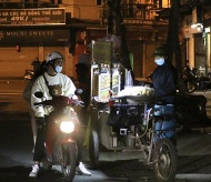 Hanoi's outdoor workers make a living in chilly cold nights