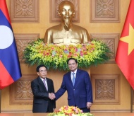 Lao PM arrives in Hanoi, 1st guest of Vietnam in 2022 