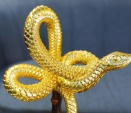 A glimpse of the 24K gold Lunar New Year 2025 Snake Mascot