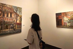 Artist captures old and new of Hanoi