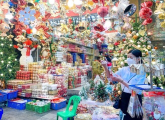 Hanoi’s Old Quarter streets sparkle and bustle ahead of Christmas