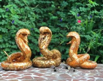 Behold the unique collection of snake lacquer statues