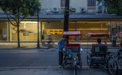 Enjoying coffee at dawn in Hanoi