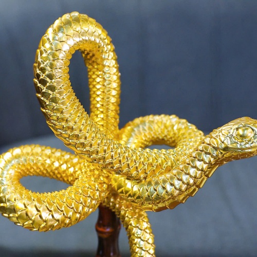 A glimpse of the 24K gold Lunar New Year 2025 Snake Mascot